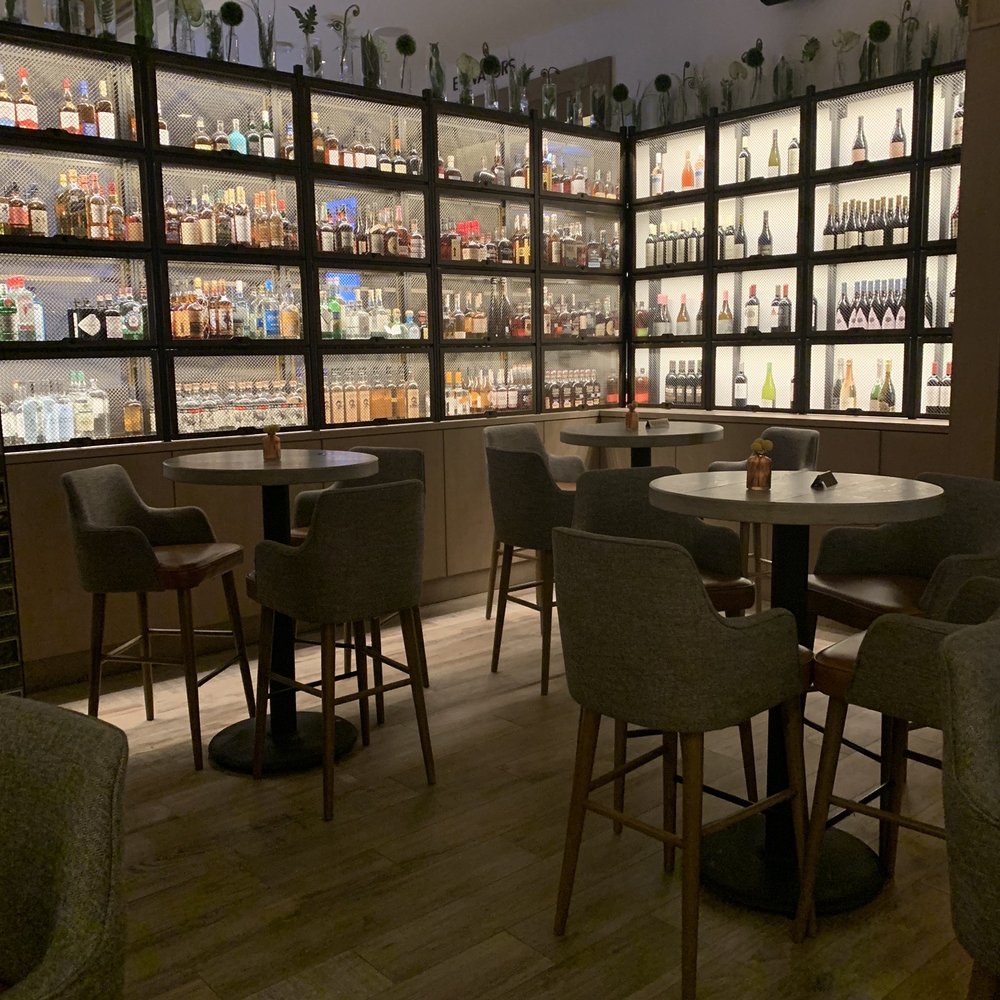 Corinne Austin - High-top Bar Seating - New American Near Me - Austin, Texas Corinne Austin - High-top Bar Seating - New American Near Me - Austin, Texas