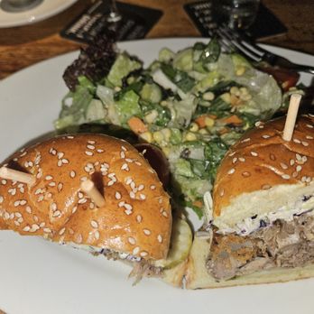Doc B's Restaurant + Bar - Pork sandwich with BBQ on side and house salad. - Bars Near Me - Coral Gables, Florida Doc B's Restaurant + Bar - Pork sandwich with BBQ on side and house salad. - Bars Near Me - Coral Gables, Florida