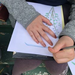 City Garden School - Students explore the wonders of botany by sketching flowers in the great outdoors.