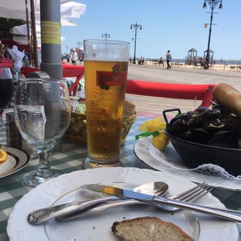 Tatiana Cafe - a plate of mussels, bread, and a glass of beer - Cafes Near Me - Brooklyn, New York Tatiana Cafe - a plate of mussels, bread, and a glass of beer - Cafes Near Me - Brooklyn, New York