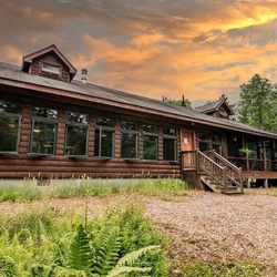 Packbasket Adventures - Packbasket Adventures Bed & Breakfast and Event Center - Back of Lodge at Sunset