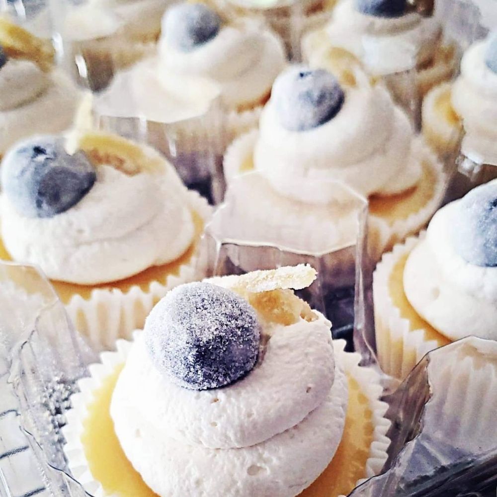 Sweet Mims - a tray of cupcakes with blueberries - Desserts Near Me Sweet Mims - a tray of cupcakes with blueberries - Desserts Near Me