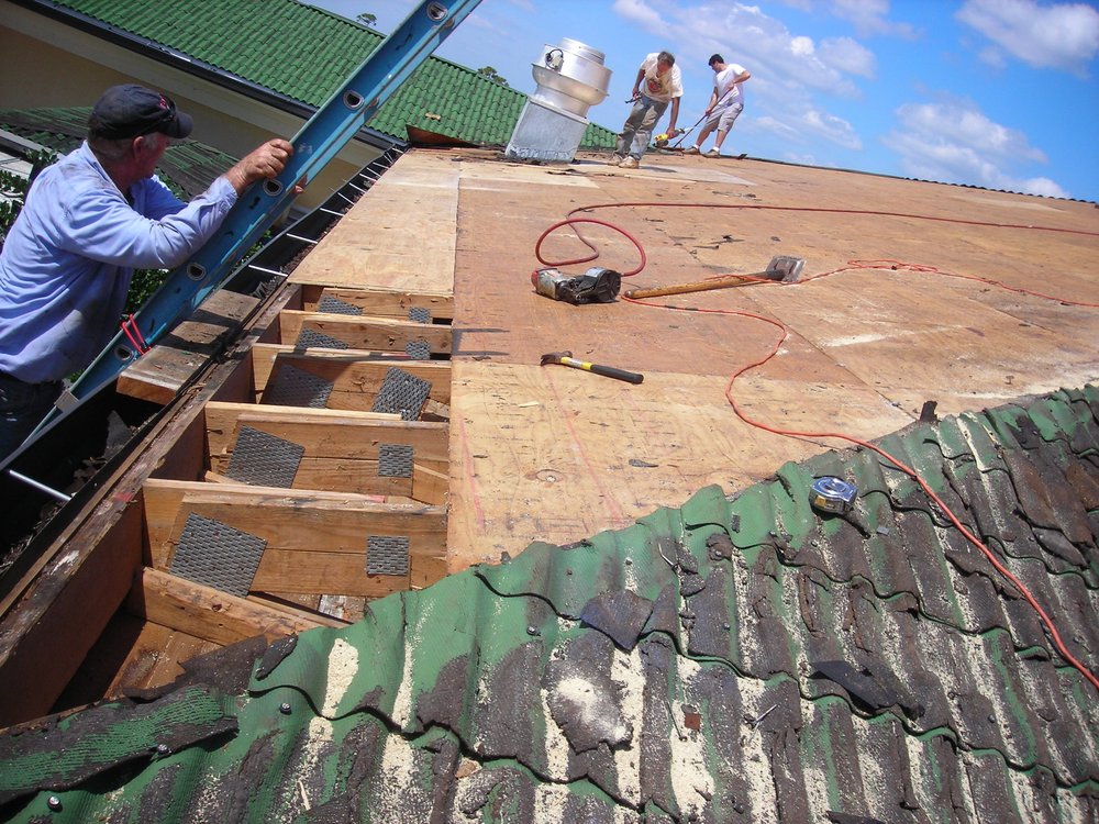 Slide of J K Behan Roofing