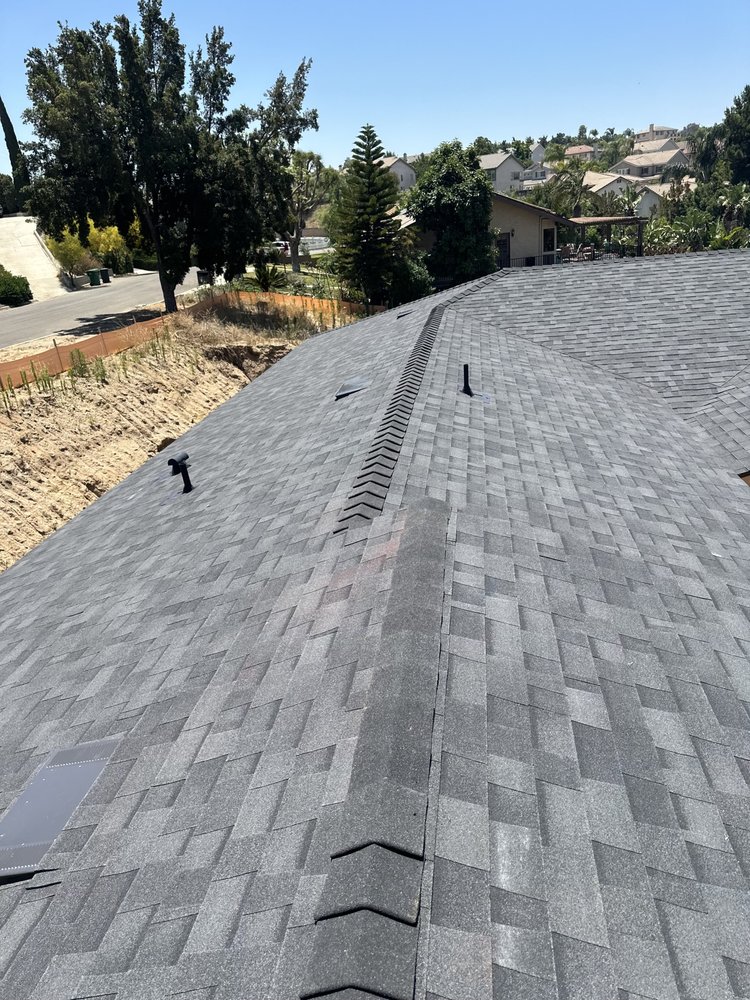 Slide of Meza's Roofing