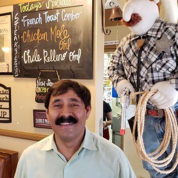 Joanna's Cafe - Jose the owner and his mascot - Breakfast & Brunch Near Me - Riverside, California Joanna's Cafe - Jose the owner and his mascot - Breakfast & Brunch Near Me - Riverside, California