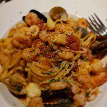 L'italiano Restaurant - a plate of pasta with shrimp and musselling - Italian Near Me - Bossier City, Louisiana L'italiano Restaurant - a plate of pasta with shrimp and musselling - Italian Near Me - Bossier City, Louisiana