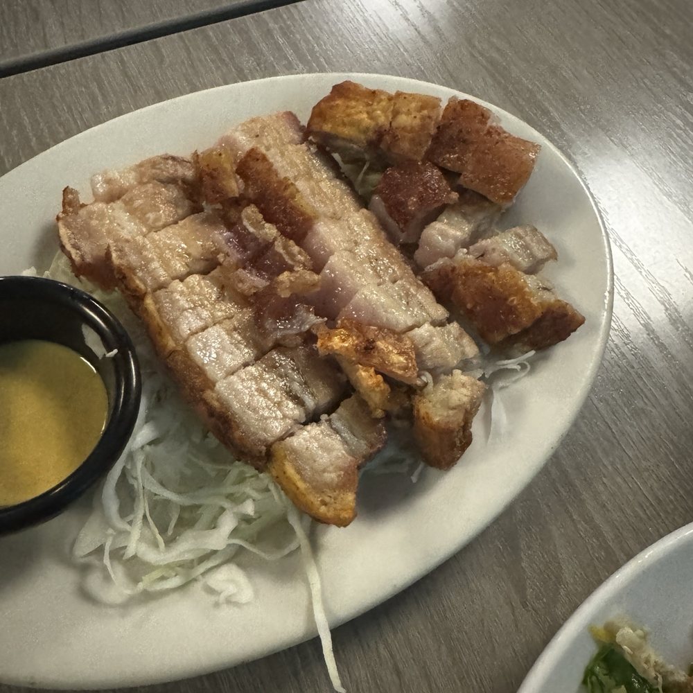 Crispy Skin Roast Pork served with Chinese style hot mustard & shoyu....Surprised it wasn't served with Ketchup ($20) Crispy Skin Roast Pork served with Chinese style hot mustard & shoyu....Surprised it wasn't served with Ketchup ($20)