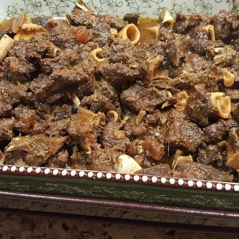 Ross Caribbean Delight - This is stew goat served brown rice or any other dish - Caterers Near Me Ross Caribbean Delight - This is stew goat served brown rice or any other dish - Caterers Near Me