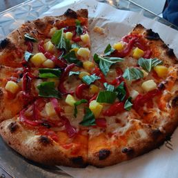 Pineapple, basil and vegan cheese.