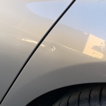 West Coast Paintless Dent Repair - Ding in rear quarter panel. - Mobile Dent Repair Near Me