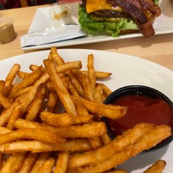 Beastro And Barley - Bacon burger and table fries.