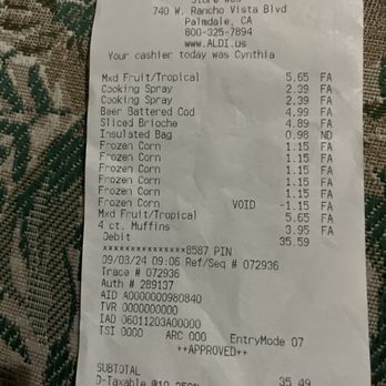 ALDI - Today's receipt. I bought four frozen bags of corn and she charged five‍ - Grocery Near Me - Palmdale, California