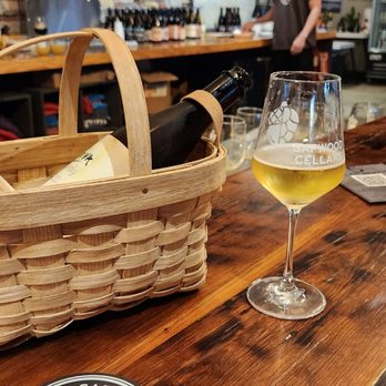 Sapwood Cellars Brewery - a basket of wine and a glass of wine - Breweries Near Me - Columbia, Maryland Sapwood Cellars Brewery - a basket of wine and a glass of wine - Breweries Near Me - Columbia, Maryland