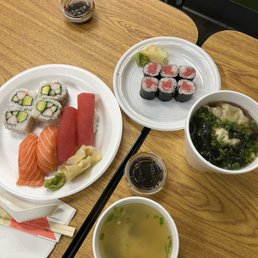 Sushi combo, tuna rolls, miso soup and wonton ramen Sushi combo, tuna rolls, miso soup and wonton ramen