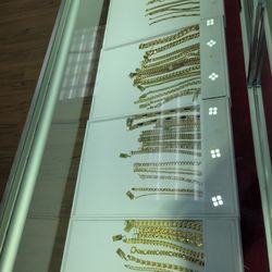 West Michigan Jewelry Exchange - Gold necklace and bracelets.