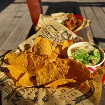 The Yard @ 1224 - Homemade tortilla chips and carnita queso - Cocktail Bars Near Me - San Antonio, Texas The Yard @ 1224 - Homemade tortilla chips and carnita queso - Cocktail Bars Near Me - San Antonio, Texas