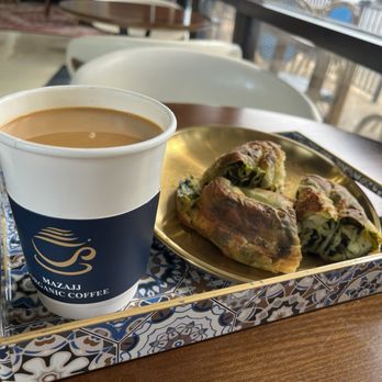 Mazajj Organic Coffee - adeni chai, spinach feta roll - Coffee & Tea Near Me - Houston, Texas