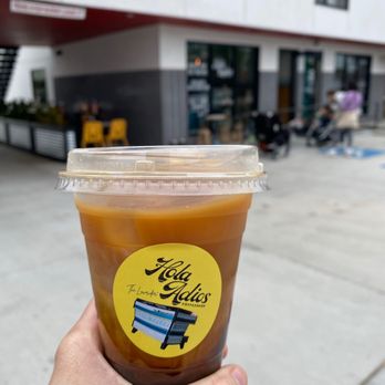 Hola Adios Coffeeshop - Iced americano and front of coffee shop pictured. - Coffee & Tea Near Me - Costa Mesa, California