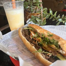Peach smoothie and 1. House Special Banh Mi Peach smoothie and 1. House Special Banh Mi