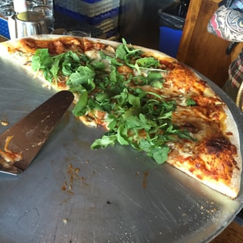 Trophy Brewing - Most Outgoing Pizza - mushrooms, arugula, cheese and more cheese - Bars Near Me - Raleigh, North Carolina
