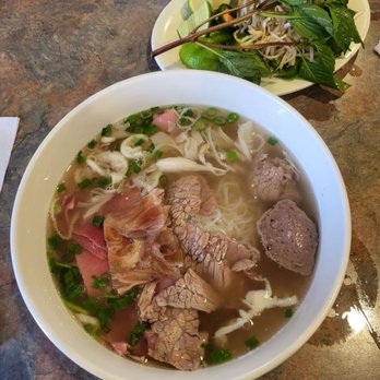 Pho 888 Vietnamese Noodle & Grill - Look at that "slice" of a meatball and cloudy warm broth. - Vietnamese Near Me - Aurora, Colorado Pho 888 Vietnamese Noodle & Grill - Look at that "slice" of a meatball and cloudy warm broth. - Vietnamese Near Me - Aurora, Colorado