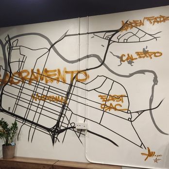 Roasted Threads - The space between entrance and the ordering station - Vinyl Records Near Me - Sacramento, California