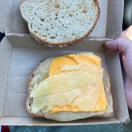 Cheese slightly melted from the Luke warm bread and Arizona heat.