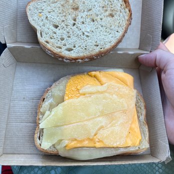 Dunkin' - Cheese slightly melted from the Luke warm bread and Arizona heat. - Donuts Near Me - Peoria, Arizona
