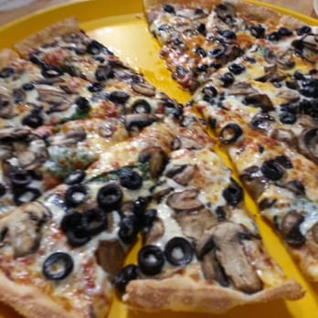 Round Table Pizza - Skinny w/spinach (1 leaf?!), olive, mushroom. Good! ...but RT cheated me on the spinach. - Pizza Near Me - Fullerton, California