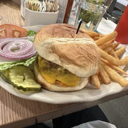 Homemade Veggie Burger - subbed cheddar for vegan cheese. Homemade Veggie Burger - subbed cheddar for vegan cheese.
