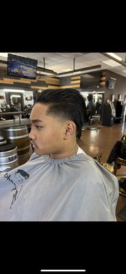 Tapers - This haircut is a slick back with a mid taper. They’re many variations of the taper we can do it all. Tapers - This haircut is a slick back with a mid taper. They’re many variations of the taper we can do it all.