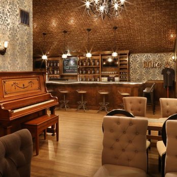 Sidecar Tasting Room - a piano in the middle of the room - Wine Bars Near Me - Dripping Springs, Texas Sidecar Tasting Room - a piano in the middle of the room - Wine Bars Near Me - Dripping Springs, Texas