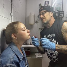 Preparing area for piercing.