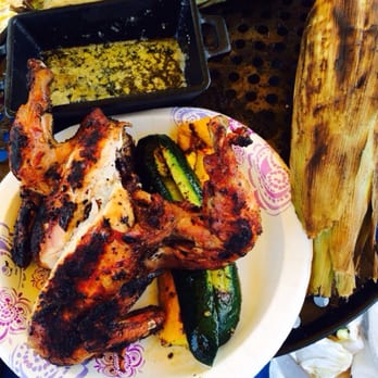 999 Hiawatha Apartments - Grilled Hen Zucchini Corn on the Cob & Garlic butter. Rooftop Grilling @ the Hiawatha - Apartments Near Me - Seattle, Washington