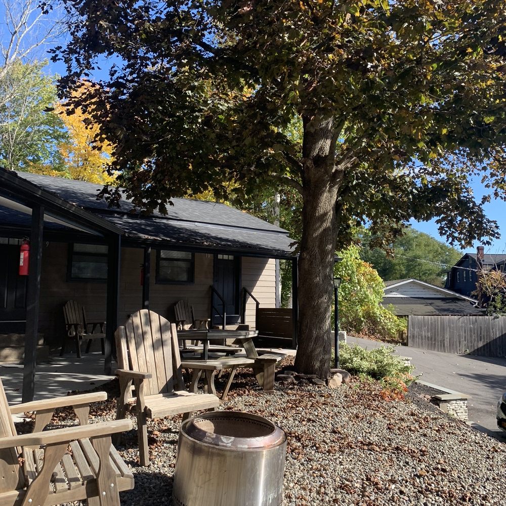 Union + Post - a patio with chairs and a fire pit - American Near Me - Windham, New York