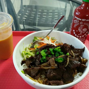 Vietnamese Grille - Thai tea and noodle bowl with beef and veggies. - Vietnamese Near Me - Gainesville, Florida Vietnamese Grille - Thai tea and noodle bowl with beef and veggies. - Vietnamese Near Me - Gainesville, Florida