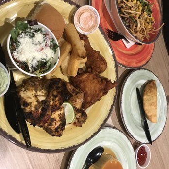 Pollo Campero - $20 worth of food  - Half Chicken Special (4 Pieces, 2 Sides), Grilled Chicken Bowl, Verde Empanada and Flan - Latin American Near Me - Charlotte, North Carolina