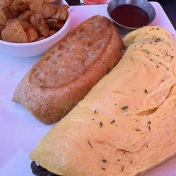 Teaspoon - Filet mignon omelet with requested sour dough toast & jelly ( as mentioned on a Yelp review thank you) fyi potatoes extra. - Breakfast & Brunch Near Me - Tucson, Arizona