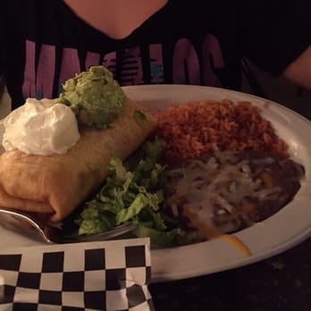 Sonrisa Grill - Shredded Beef Chimichanga with lettuce, beans, rice, guacamole and sour cream. - Mexican Near Me - Henderson, Nevada