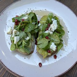 Cathedral Café - Toast with avocado, goat cheese, greens, and pomegranate seeds~