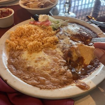 Manuel's Mexican Restaurant - Cheese Enchiladas with extra sauce for chips dipping - Mexican Near Me - Aptos, California Manuel's Mexican Restaurant - Cheese Enchiladas with extra sauce for chips dipping - Mexican Near Me - Aptos, California