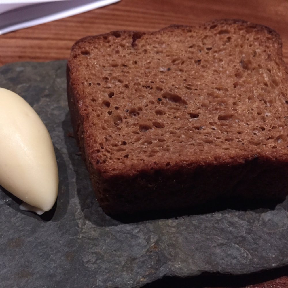 Lazy Bear - cultured butter (tastes like cheese) served with brown butter brioche - New American Near Me - San Francisco, California Lazy Bear - cultured butter (tastes like cheese) served with brown butter brioche - New American Near Me - San Francisco, California