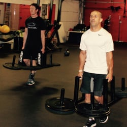 Pit Fit Training - Two Indycar champions and Indy 500 winners Scott Dixon and Tony Kanaan working hard with Farmers Walks!