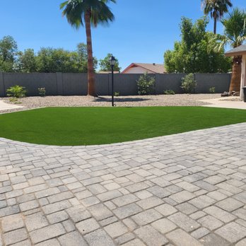 Windmill Outdoor Development - a backyard with artificial grass - Landscaping Near Me Windmill Outdoor Development - a backyard with artificial grass - Landscaping Near Me