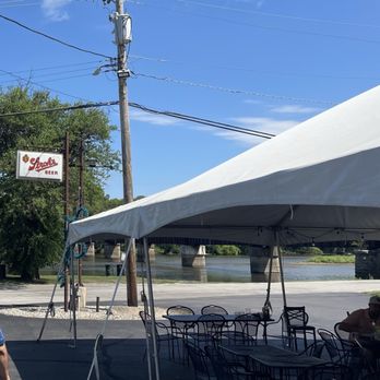 Ryans Pier - Tent set up out front with several tables and chairs - American Near Me - Aroma Park, Illinois