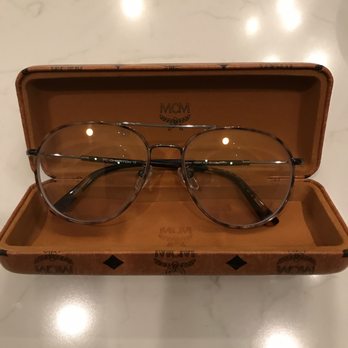 Resolution Eyecare - Transition lens with mirror finish - Optometrists Near Me - Austin, Texas
