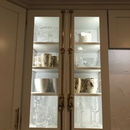 Kitchen cabinets fitted with custom antique glass
