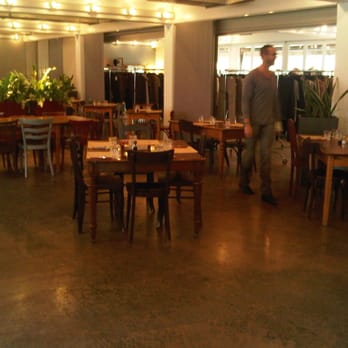 L'Adresse - Coté Restaurant - Restuarant area. You can see the fashion boutique in the background. - Modern European Near Me - Geneva, GE