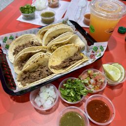 Carne asada, barbacoa and pollo tacos on corn tortillas Carne asada, barbacoa and pollo tacos on corn tortillas