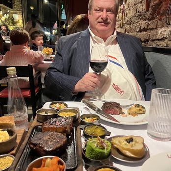 La Cabrera - My husband enjoying our meal. - Steakhouses Near Me - Buenos Aires, C La Cabrera - My husband enjoying our meal. - Steakhouses Near Me - Buenos Aires, C